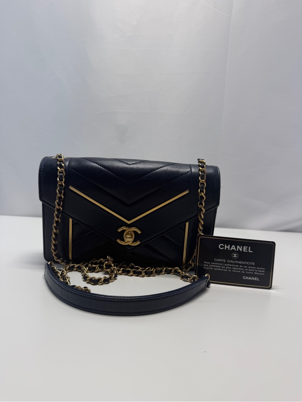 CHANEL Black Chevron Quilted Leather Shoulder Bag with Gold Hardware